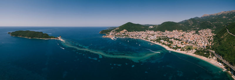 Scenic view of sea against blue sky