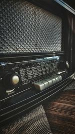 Close-up of vintage radio on table