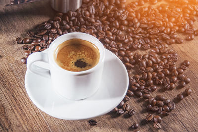 High angle view of coffee cup on table