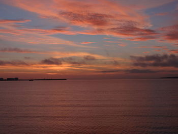 Scenic view of sea at sunset