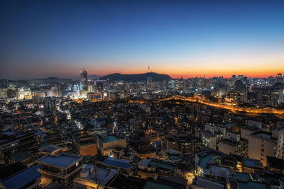 Sunset view over seoul city with view of n seoul tower. taken from changsindong, seoul, south korea.