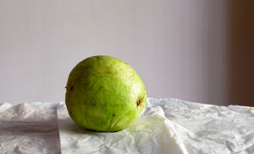 Close-up of apple on table