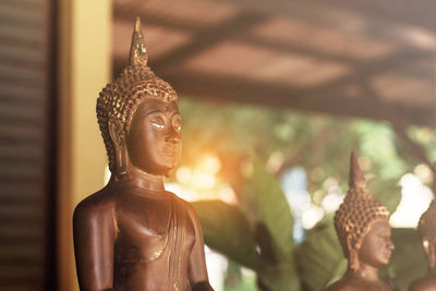 Close-up of buddha statues