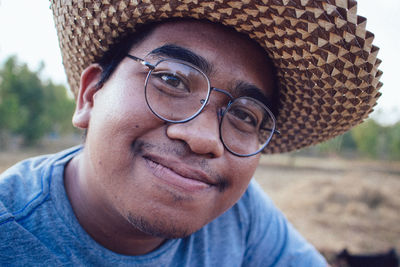 Portrait of man wearing hat