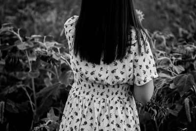 Close-up of girl standing on field