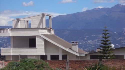 Built structure with mountains in background