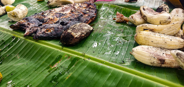 High angle view of food on leaves
