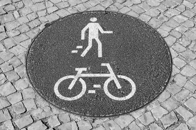 High angle view of bicycle sign on street