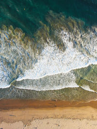 Aerial view of shore during sunny day