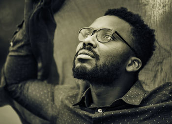 Portrait of young man looking away