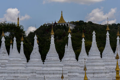 Panoramic view of temple building against sky