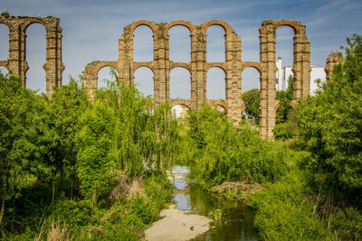 The acueducto de los milagros miraculous aqueduct is the ruins of a roman aqueduct bridge