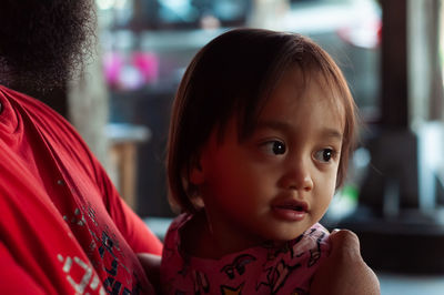 Portrait of an asian toddler baby, outdoor.