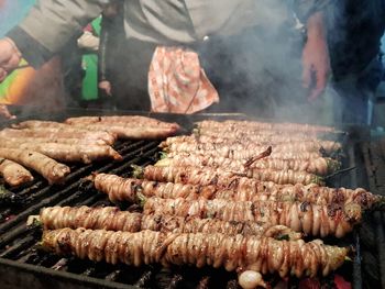 Close-up of meat on barbecue grill