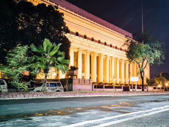 View of city lit up at night