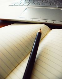 Close-up of pen on table