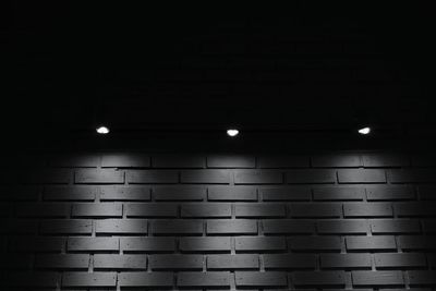 Full frame shot of illuminated lights on wall