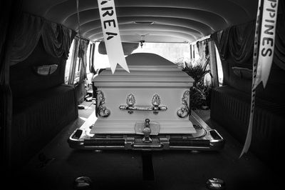 Coffin in van