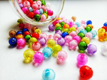 High angle view of multi colored candies on table