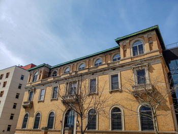 Low angle view of old building against sky