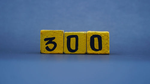 Close-up of toy blocks on blue background
