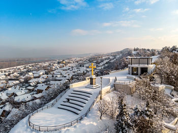 High angle view of buildings against sky during winter