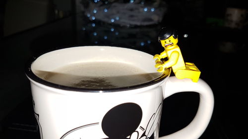 Close-up of coffee cup on table
