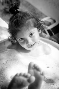 Portrait of shirtless boy in bathroom