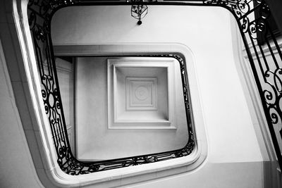 Directly below shot of spiral staircase in building