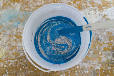 High angle view of blue bowl on table