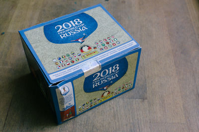 High angle view of information sign on table