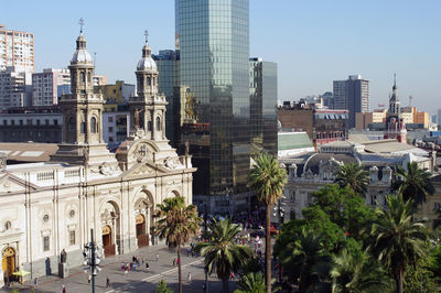 Buildings in city against sky