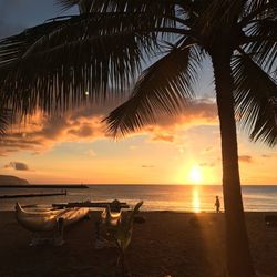 Scenic view of sea against sky at sunset