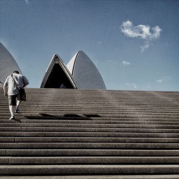 WOMAN WALKING ON STEPS