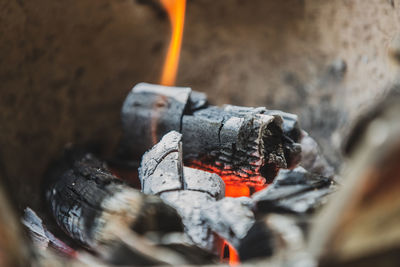 Close-up of fire on wood