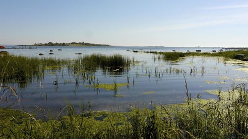 Scenic view of lake against sky