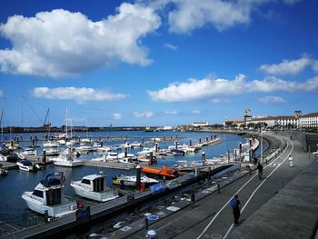 High angle view of boats moored at harbor