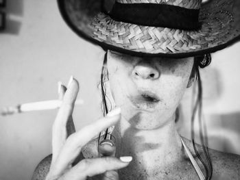 Close-up of woman smoking cigarette