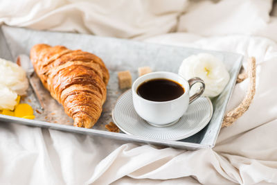 Coffee and cups on table