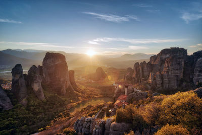 Scenic view of landscape against sky during sunset