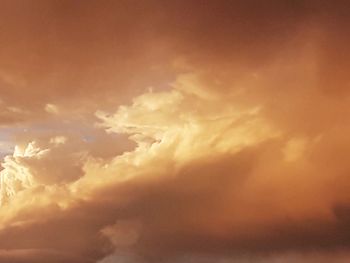 Low angle view of clouds in sky during sunset