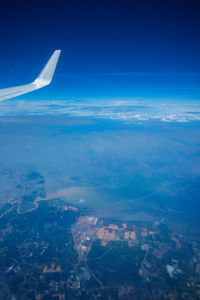 Aerial view of city against sky