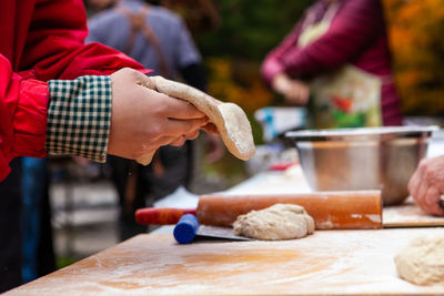 Cropped image of man preparing food