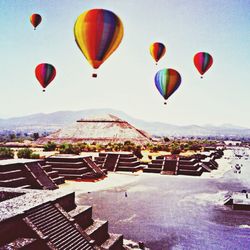 Hot air balloons against clear sky