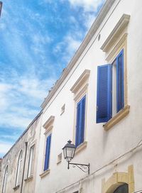 Low angle view of residential building against sky