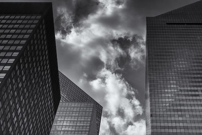 Low angle view of modern buildings against sky