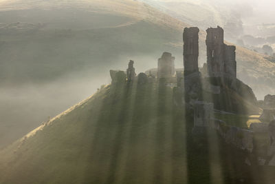 Panoramic view of rock formation against sky