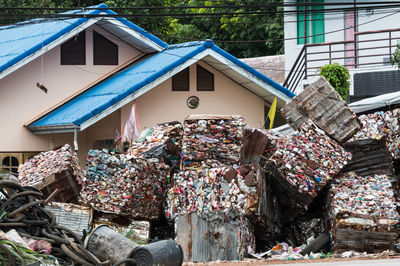 Bundles of garbage against building