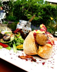 Close-up of burger in plate on table
