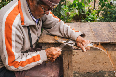 Man working on wood